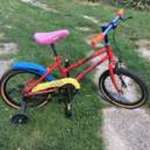 Kiváló állapotban lévő gyermek kerékpár pótkerékkel eladó! fotó