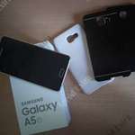 Samsung Galaxy A5 okostelefon tokokkal fotó