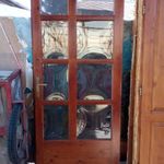 Bontott üvegbetétes kétszárnyú ajtó és tokkal egyben fotó