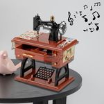 Klasszikus retro zenélő varrógép, zenedoboz, varrógép makett fotó