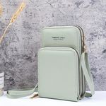 Női kis táska, mobil táska, világos zöld fotó