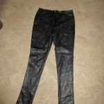 Újszerű YUETU 40-42-s elasztikus fekete, textilbőr nadrág. fotó