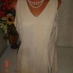Újszerű 46-s béléses, harang aljú, krém színű maxi ruha. fotó