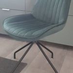Zöld bársony forgó szék fotó