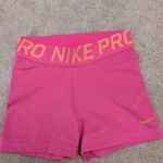 NIKE DRI-FIT női M-es pink színű fitnesz short, sportnadrág , short , tökéletes állapotban fotó