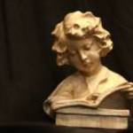 Antik fekete gipsz szobor olvasó női fej porté fotó
