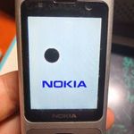 Nokia 6700 SLIDE Független+töltő, egy nagy fekete pötty van a kijelzőn , kijelző előtti plexi karcos fotó