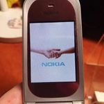 Nokia 7020 Telekomos töltővel fotó