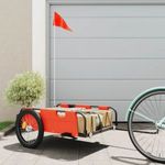 Narancssárga oxford szövet és vas kerékpár-utánfutó fotó