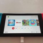 Nintendo Switch konzol dobozában, tartozékaival fotó
