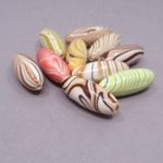 Akril gyöngy hosszúkás vegyes (10 darab) 32 mm x 16 mm fotó