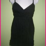 Fekete színű alul fodros, fonott vállpántú, romantikus ruha S fotó