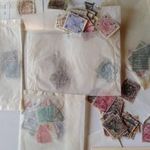 V0188 Régi külföldi bélyegek tasakokban fotó