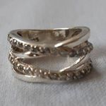 54 - es. Összefonódva, elegáns ezüst gyűrű! fotó