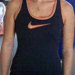 Nike fitnesz felső, póló XS-es, sportmelltartós Dri-Fit szinte új fotó