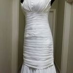 Sellő fazonú tört fehér menyasszonyi ruha fotó