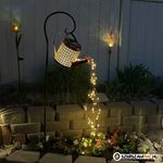 Napelemes locsolókanna világítás, leszúrható kerti dekor lámpás fotó
