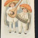 Újévi képeslap gombával, zenélő gyerekekkel lanttal, harmonikával fotó