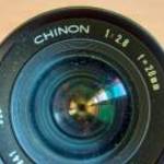 chinon 52-es 1: 28as F=28-as fényképező objektív hibátlan állapotában tartó tokjával fotó