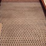 barna perzsaszőnyeg vastag perzsa szőnyeg fotó