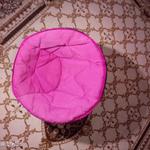 Összecsukható fotel, rózsaszínű huzattal fotó