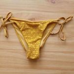 158-as mustársárga bikini alsó fotó