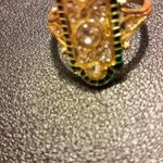 Bizsuk ékszerek gyöngyös köves aranyozott gyűrű új. fotó