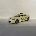 SIKU PORSCHE PANAMERA 4 S. Nyitható ajtók, GUMI-s kerekek, TAXI. ( kis Matchbox méretű) fotó