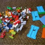 Ömlesztett kirakós játék elemek Lego, Duplo egy csomagban fotó