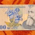 1999 -es ropogós ROMANIA - 10.000 Lei vízjeles fémszálas bankó UV aktivitással (L2606) fotó