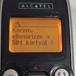 Alcatel 311 töltöttövel fotó