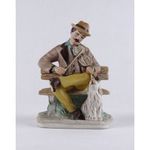 1T736 Festett biszkvit Arpo porcelán figura muzsikáló férfi kutyával 18 cm fotó