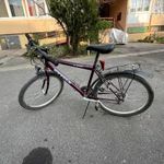 Eladó használt 26"-os, 18 sebességes, Shimano váltós lila bicikli fotó