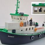 JE16 H0 1: 87 Kibri 38520 1 db ’Roland’ halász és toló-vontató hajó+Preiser hajóskapitány fotó