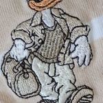 Georgya Studio Disney bézs-fehér csíkos Donald kacsa mintás pamut hosszú u. patentos V-nyakú felső fotó