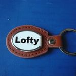 LOFTY OVÁLIS FÉM KULCSTARTÓ BŐR ALAPON! fotó