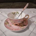 Madár motívumú porcelán teáscsésze alátéttel, teáskanállal fotó