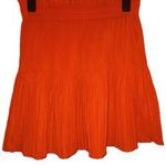 H&M pliszírozott 40-es méretű, gumis derekú, narancs színű női szoknya, ÚJSZERŰ állapotú fotó