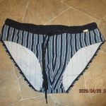 Újszerű SKINNY L-s béléses fürdőnadrág, úszónadrág. fotó
