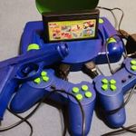 Retro sárga kazettás Nintendo klón konzol, TV játék csomag fotó