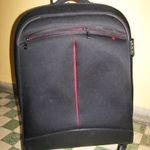 Gurulós bőrönd, 4 görgő, 70x35x25-30, vízálló, fekete-belül piros kemény vászon újszerű Expandable fotó