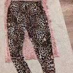 H&M női 40-42-es állatmintás jogger, házi nadrág, viszkóz anyag fotó