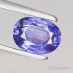 0.94ct 6.9x5.1mm Gyönyörű Lila Zafír Ékkő, High-End minőség fotó