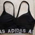 ADIDAS fekete modern stílusú minőségi S 36 SPORT MELLTARTÓ fotó