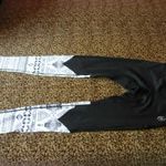 Fekete alapon mintás hosszúszárú női shell futó-sport-edző fitnesz nadrág, leggings S-es fotó