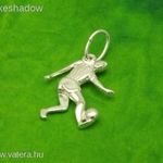 Focista labdával ezüst medál, futball játékos fotó