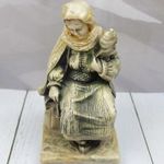 Ülő női figura ARTA APLICATA fotó