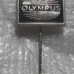 Olympus fényképezőgép jelvény fotó