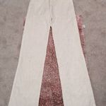 Női M-es női 38-40-es ekrű színű-törtfehér színű elegáns nadrág , egyenes szárú, normál derekú fotó