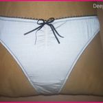 Hunkemöller fekete halvány krém színű masnis tanga S fotó